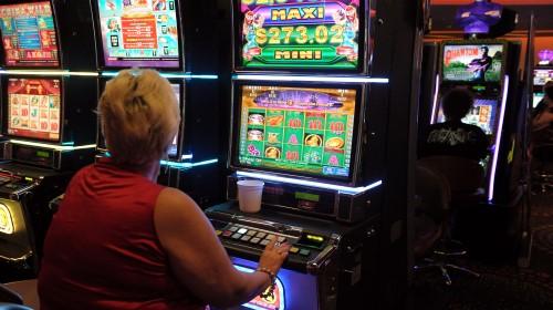 Gamblers at poker machines in Brisbane - AAP (Custom).jpg